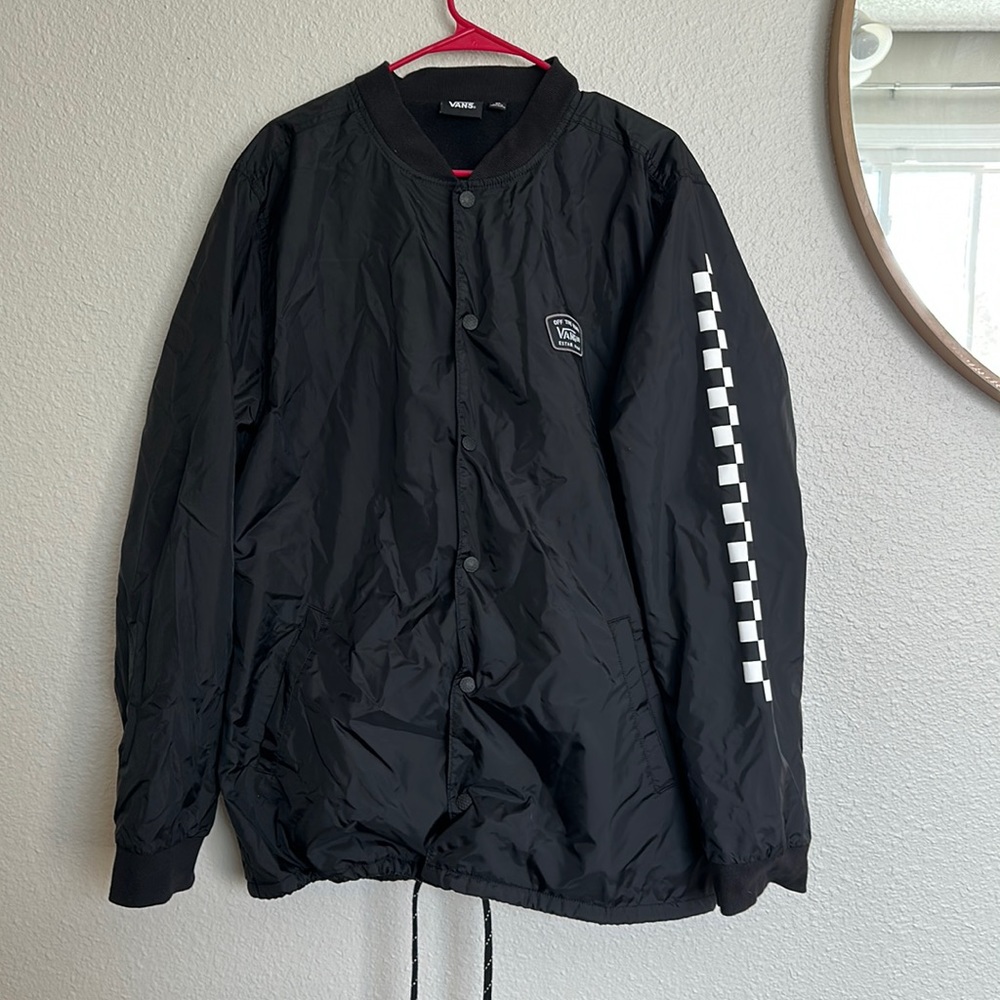 Vans, black windbreaker